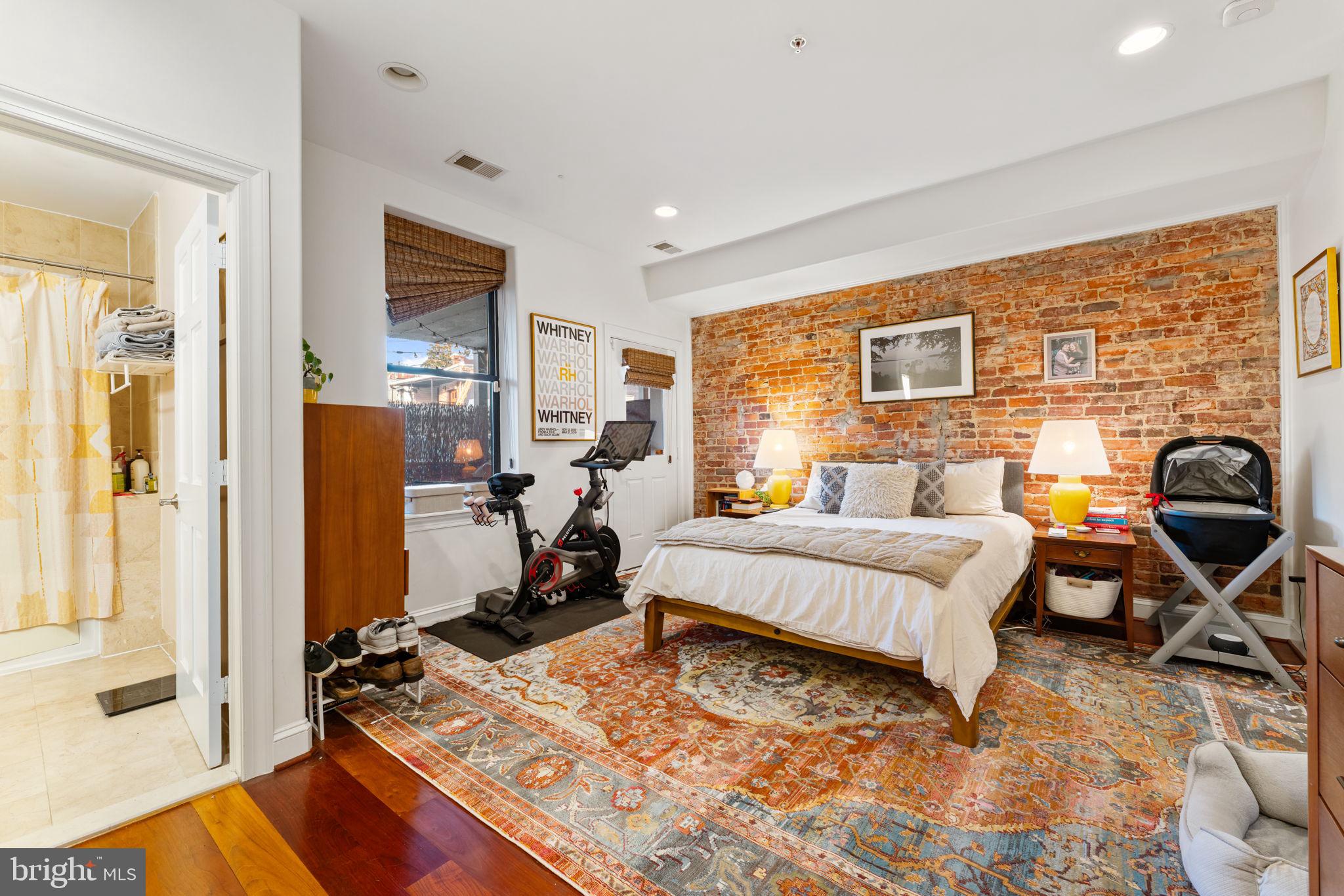 1105 Park Road Northwest, Unit 3 Washington, DC 20010 - Photo 16 of 20 a living room with furniture and a flat screen tv