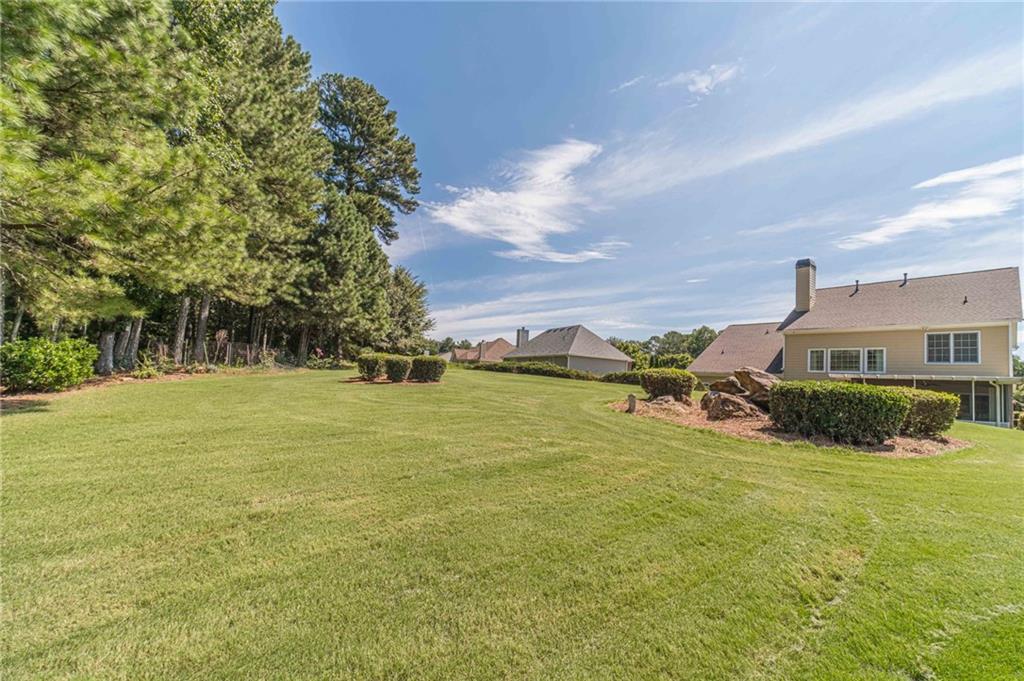 4335 Lakeside Boulevard Monroe, GA 30655 - Photo 60 of 66 a view of a fountain in front of the house