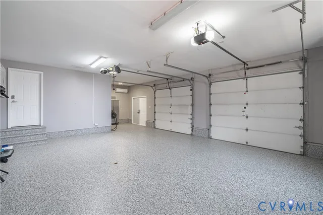 a front view of a house with a yard table and chairs