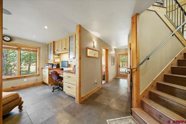 a view of livingroom with furniture and windows