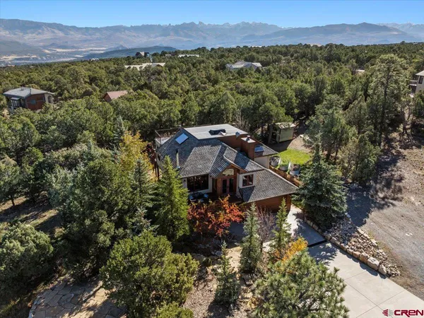 a view of a house with a mountain