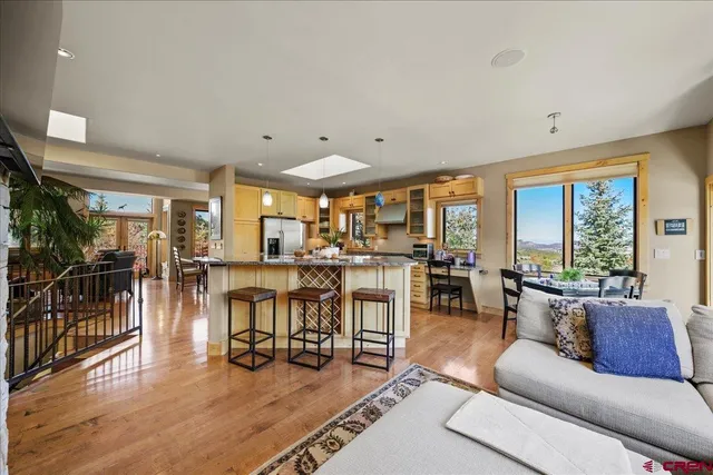 a living room with furniture and a table
