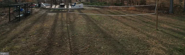 a view of a yard with a fountain