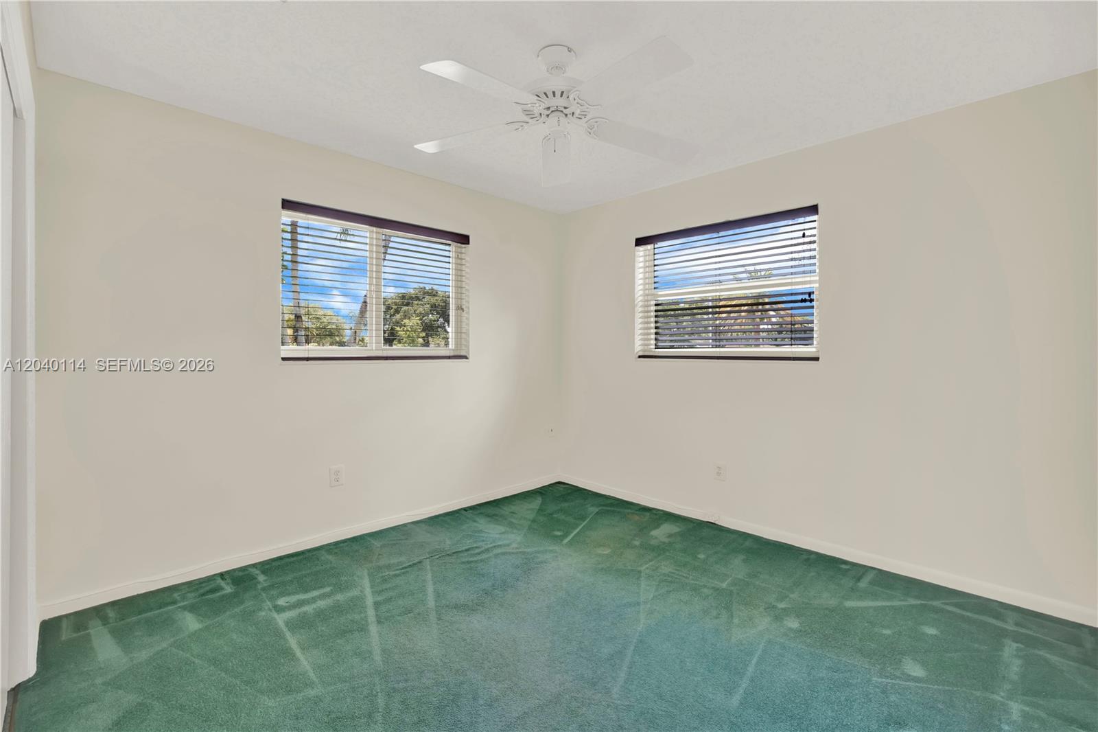 10435 Southwest 96th Street Miami, FL 33176 - Photo 20 of 44 Front east corner bedroom * terrazo flooring under the carpeting * 11' x 11'