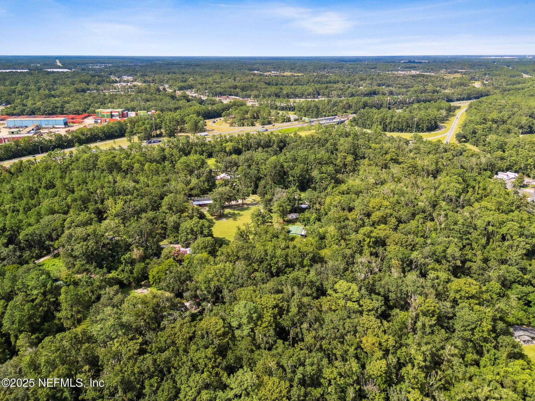 0 Moncrief Dinsmore Road Jacksonville, FL 32219 - Photo 12 of 25 an aerial view of residential houses with outdoor space and trees