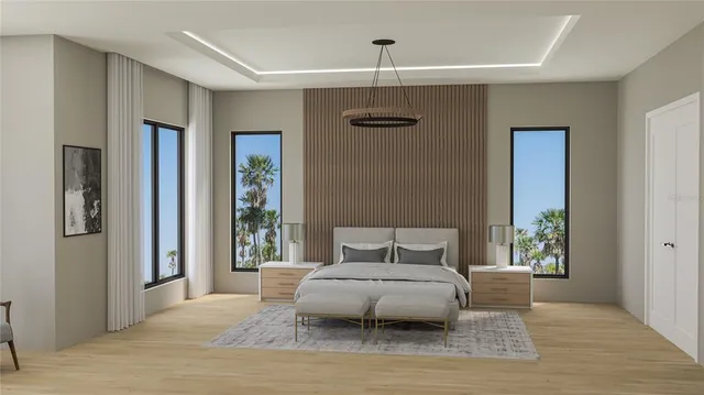 a bedroom with a large bed and a window