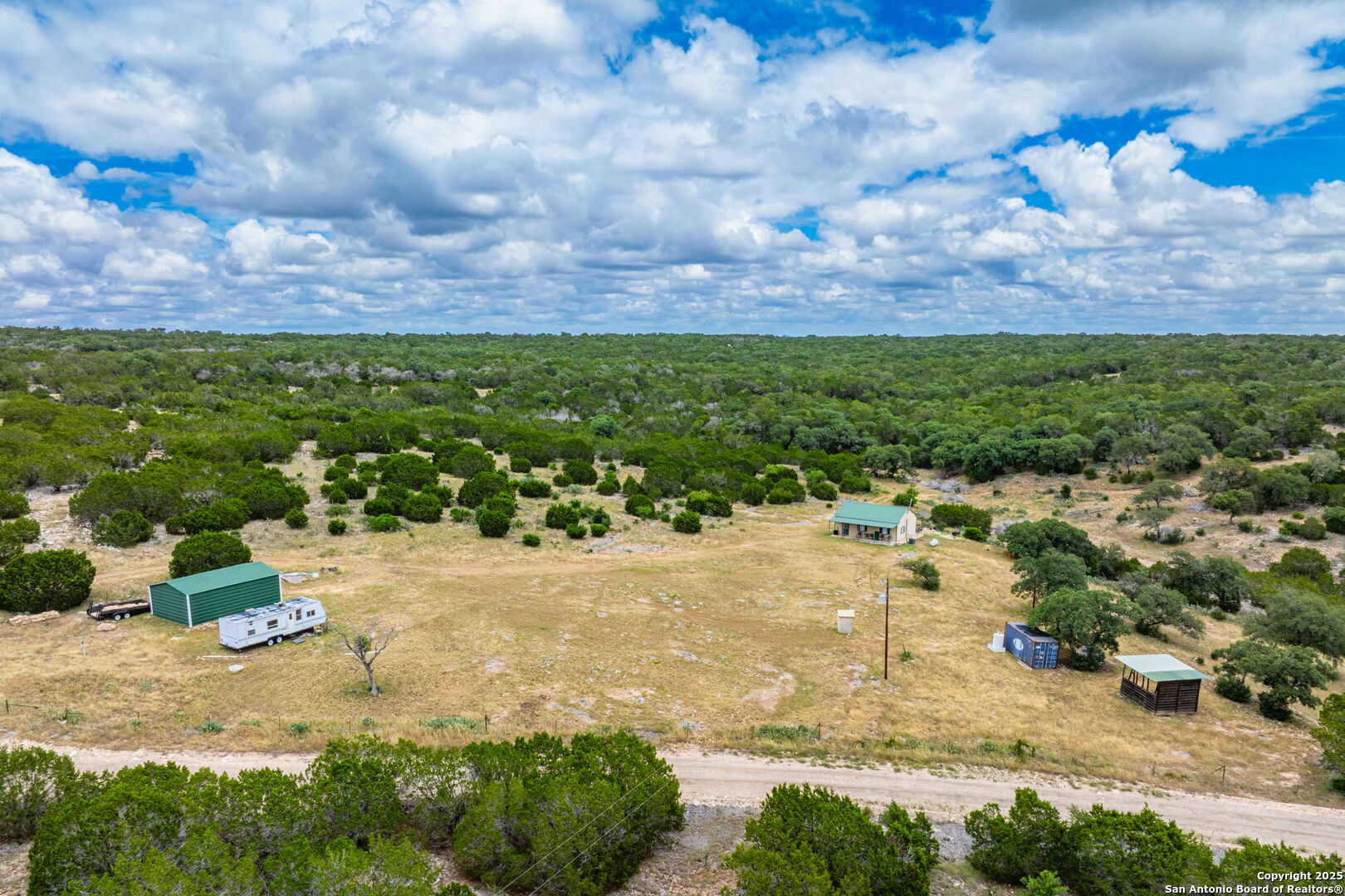485 Mitchell Ranch Road Camp Wood, TX 78833 - Photo 26 of 47 a view of a yard