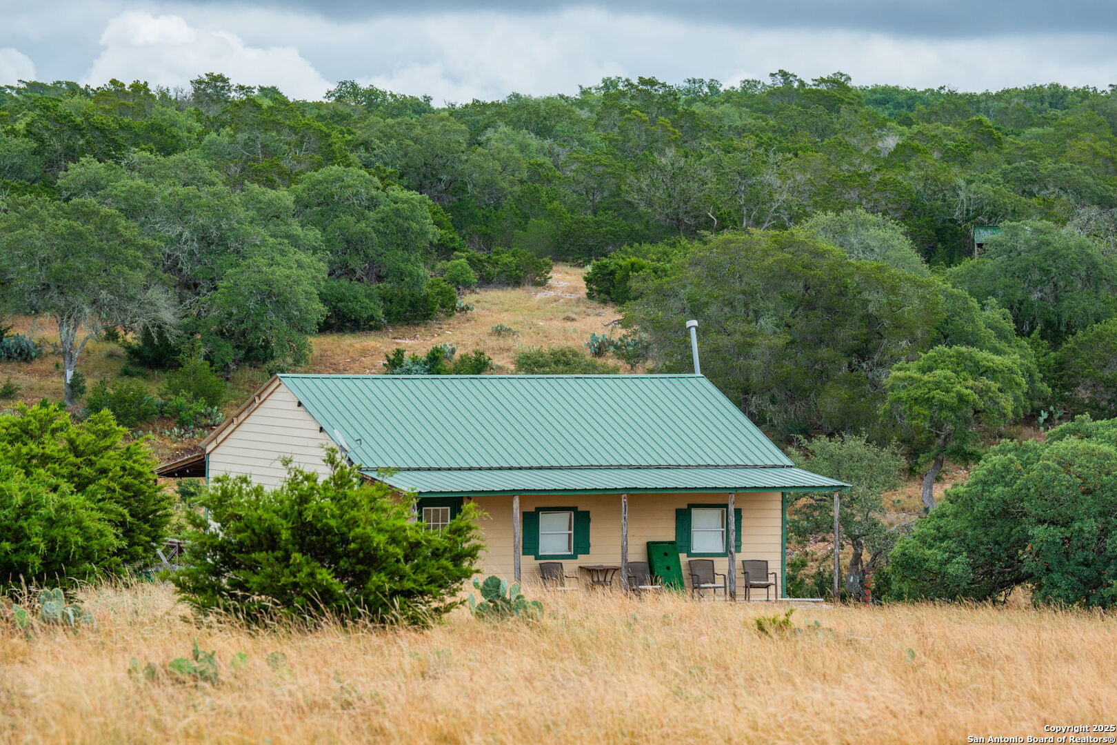 485 Mitchell Ranch Road Camp Wood, TX 78833 - Photo 28 of 47 an aerial view of a house