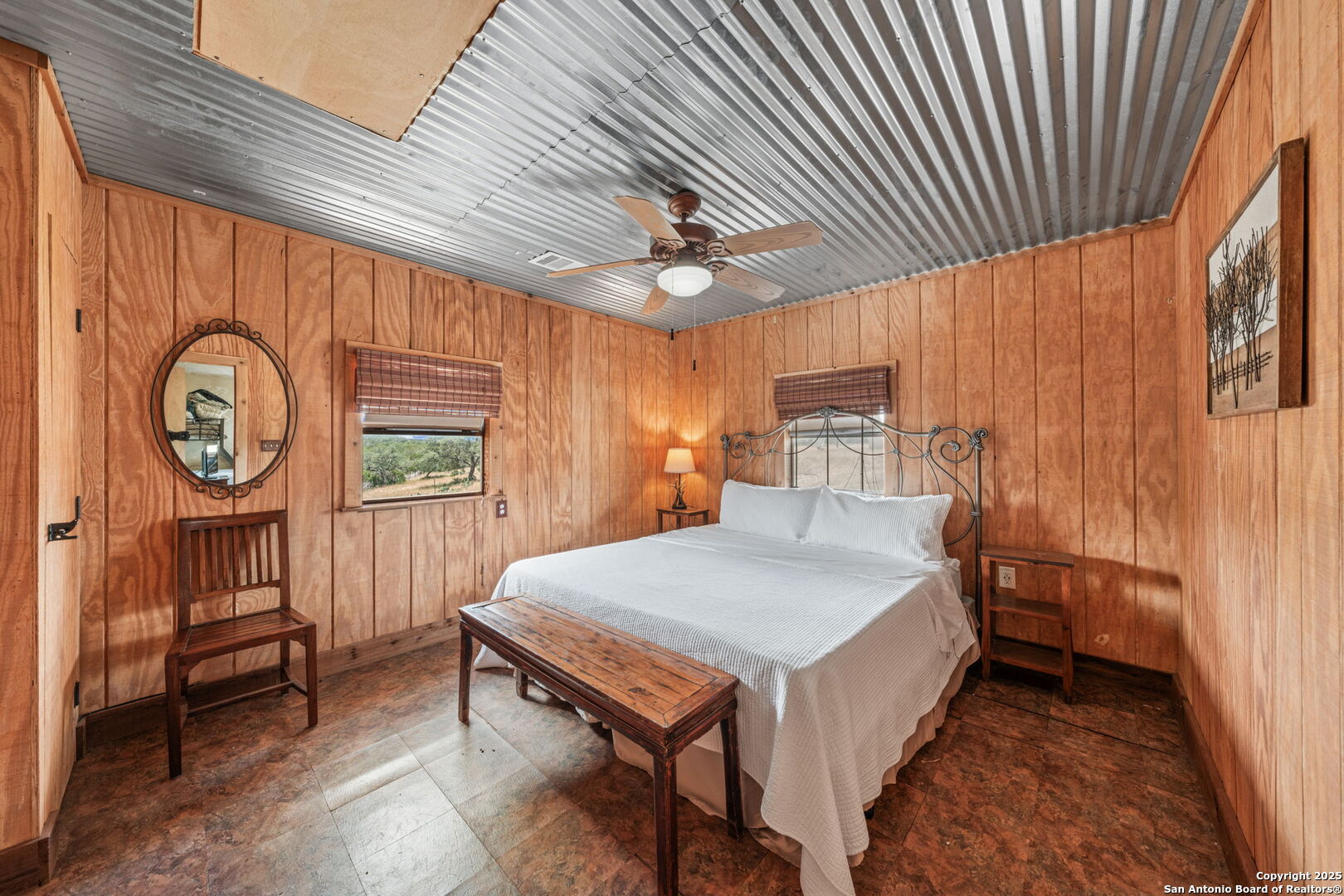 485 Mitchell Ranch Road Camp Wood, TX 78833 - Photo 33 of 47 a very nice looking bedroom with a large window