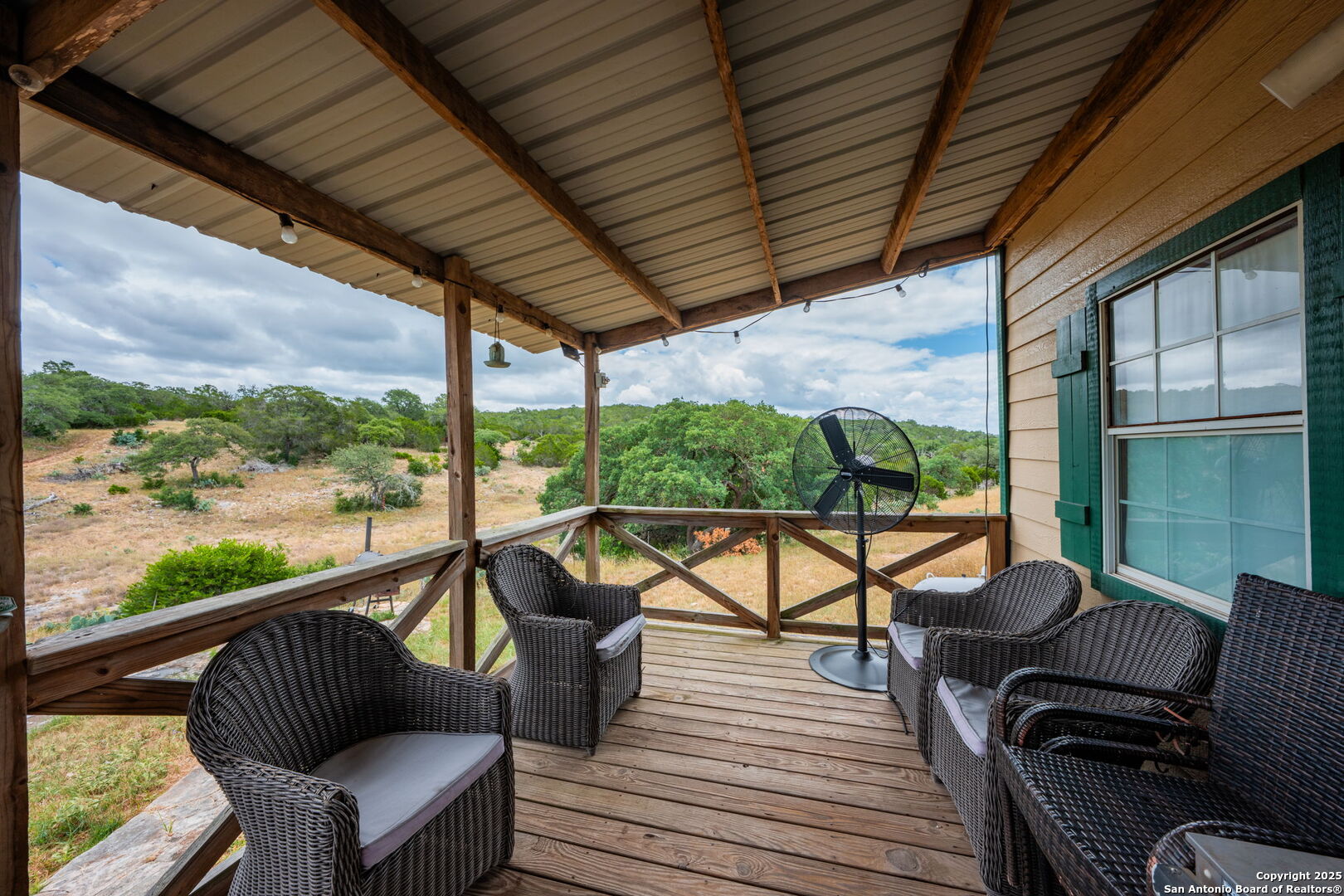 485 Mitchell Ranch Road Camp Wood, TX 78833 - Photo 36 of 47 a view of a chairs and table in patio with a fire pit