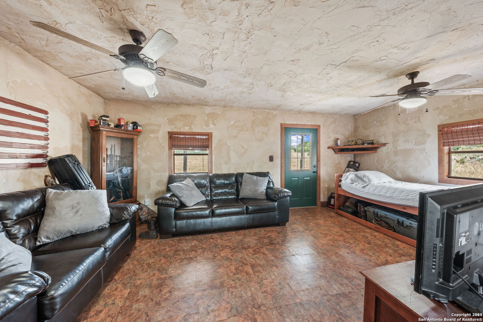 485 Mitchell Ranch Road Camp Wood, TX 78833 - Photo 37 of 47 a living room with furniture