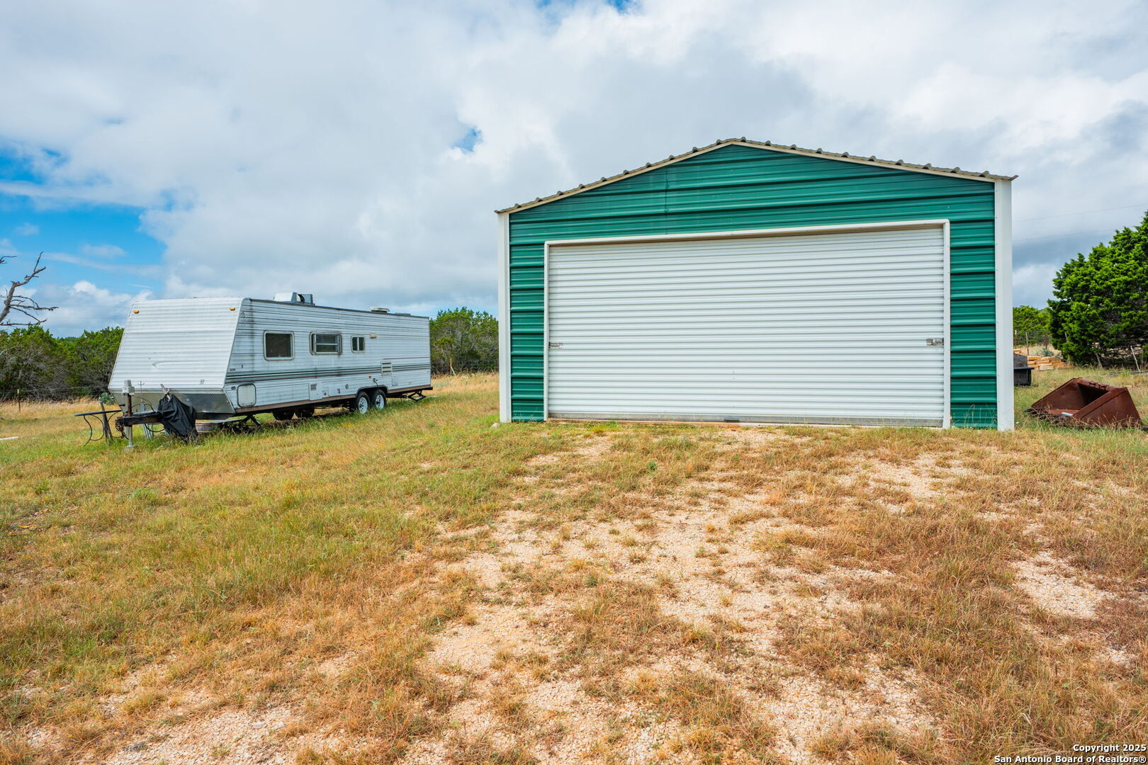 485 Mitchell Ranch Road Camp Wood, TX 78833 - Photo 40 of 47 a front view of a house with a yard