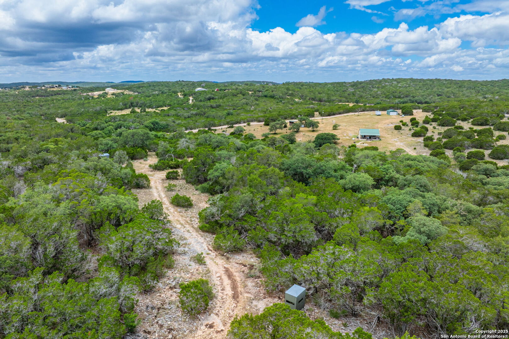 485 Mitchell Ranch Road Camp Wood, TX 78833 - Photo 45 of 47 a view of a bunch of trees and houses