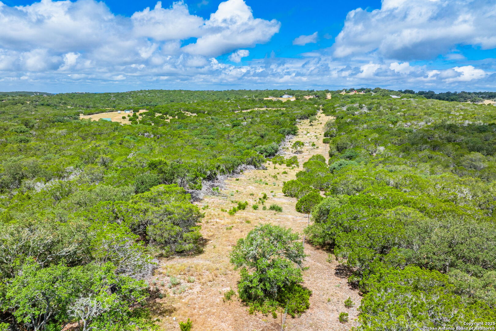 485 Mitchell Ranch Road Camp Wood, TX 78833 - Photo 46 of 47 a backyard of a building