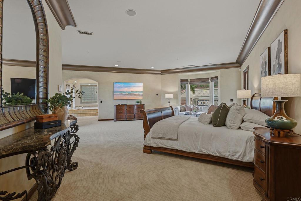 3244 Olivenhain Farms Road Encinitas, CA 92024 - Photo 24 of 47 a bedroom with furniture and a large window