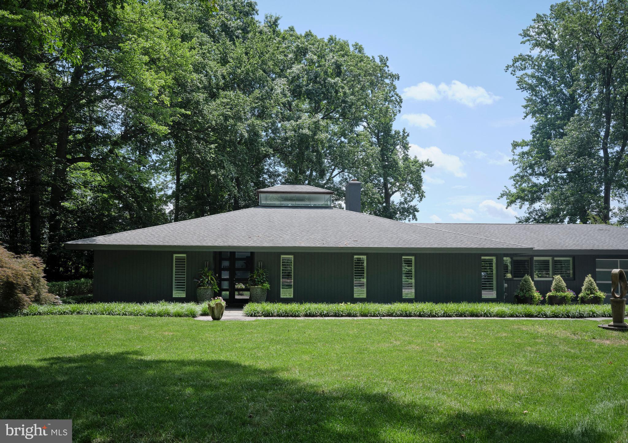 35 Raven Rock Rosemont Road Stockton, NJ 08559 - Photo 3 of 61 a front view of a house with a garden