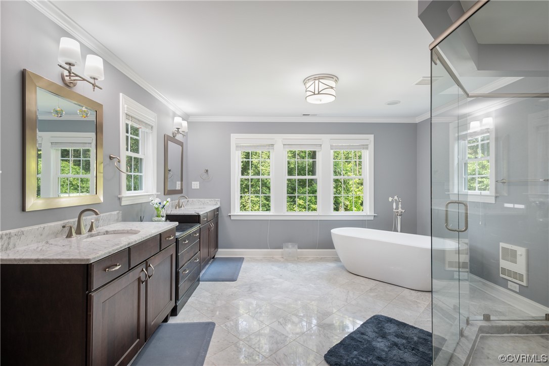 346 Ziontown Road Henrico, VA 23229 - Photo 20 of 37 a spacious bathroom with a double vanity sink large mirror and a bathtub