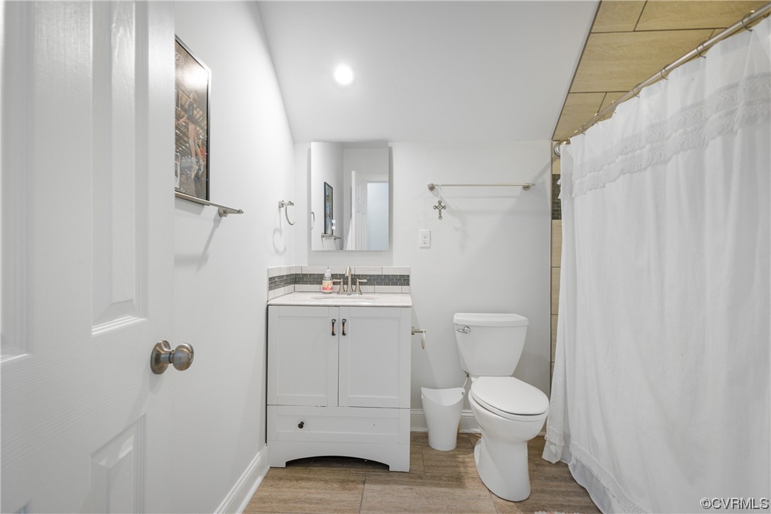 346 Ziontown Road Henrico, VA 23229 - Photo 34 of 37 a bathroom with a granite countertop sink toilet and shower