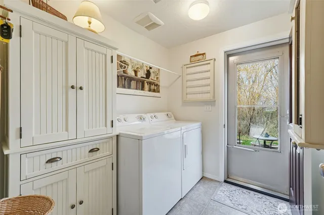 a view of bathroom with a sink and a window
