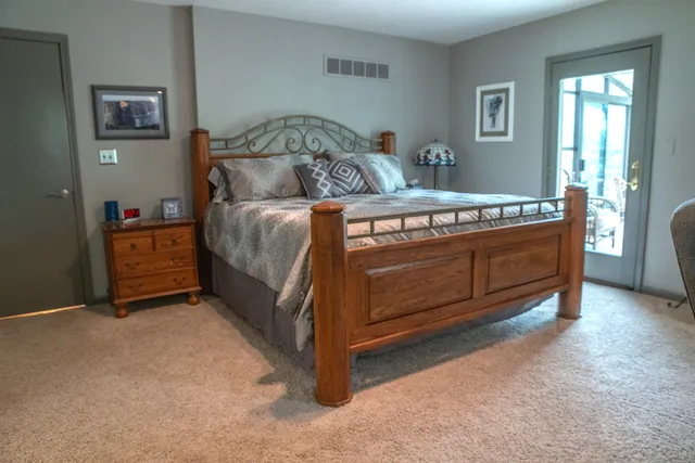 a view of a park with large trees