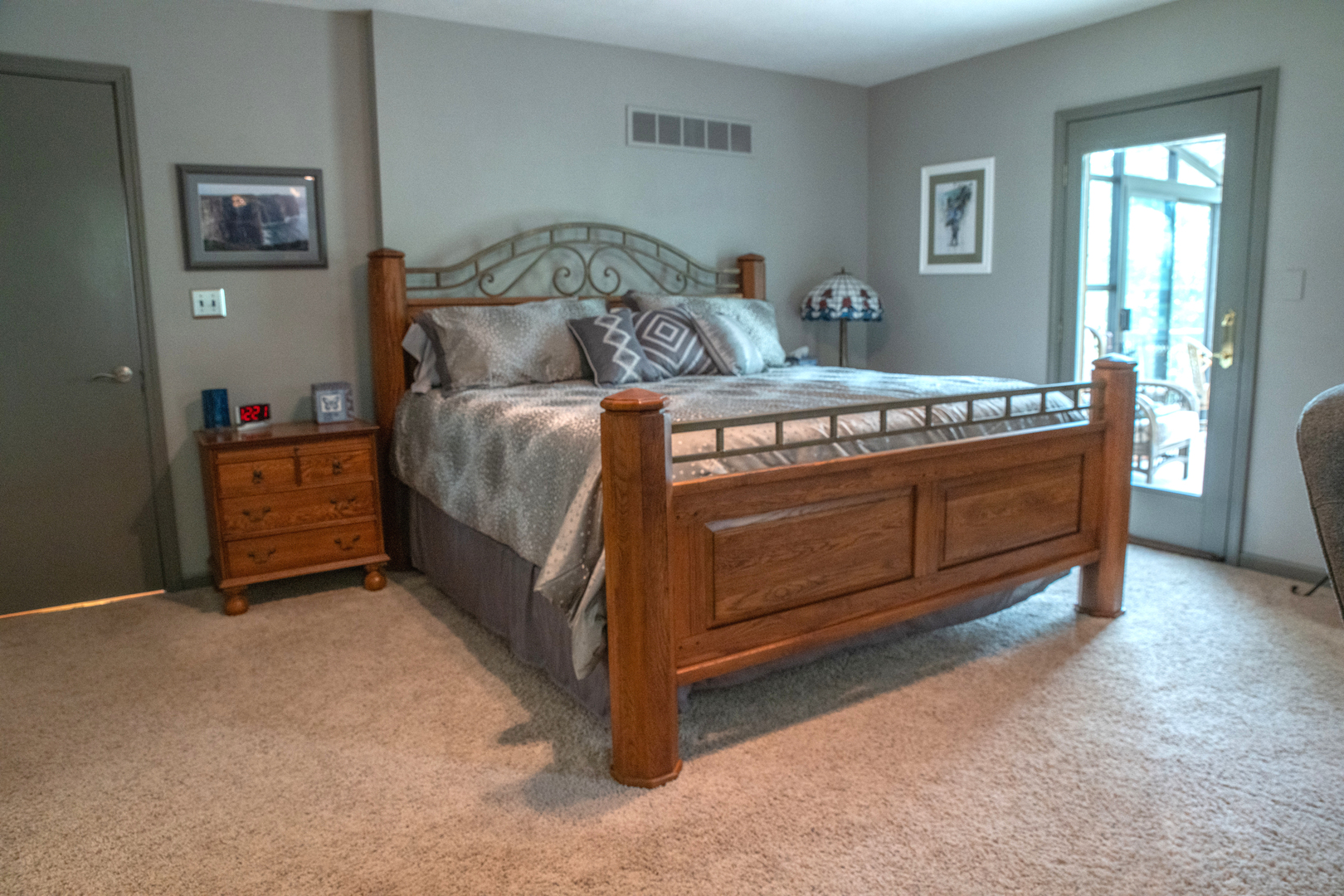 37322 Indian Spring Road Saybrook, IL 61770 - Photo 25 of 77 a bed sitting in a bedroom next to a window