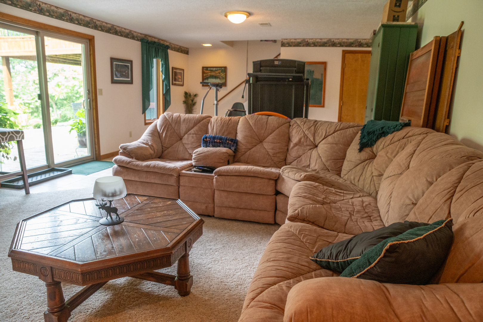 37322 Indian Spring Road Saybrook, IL 61770 - Photo 40 of 77 a living room with furniture and a flat screen tv