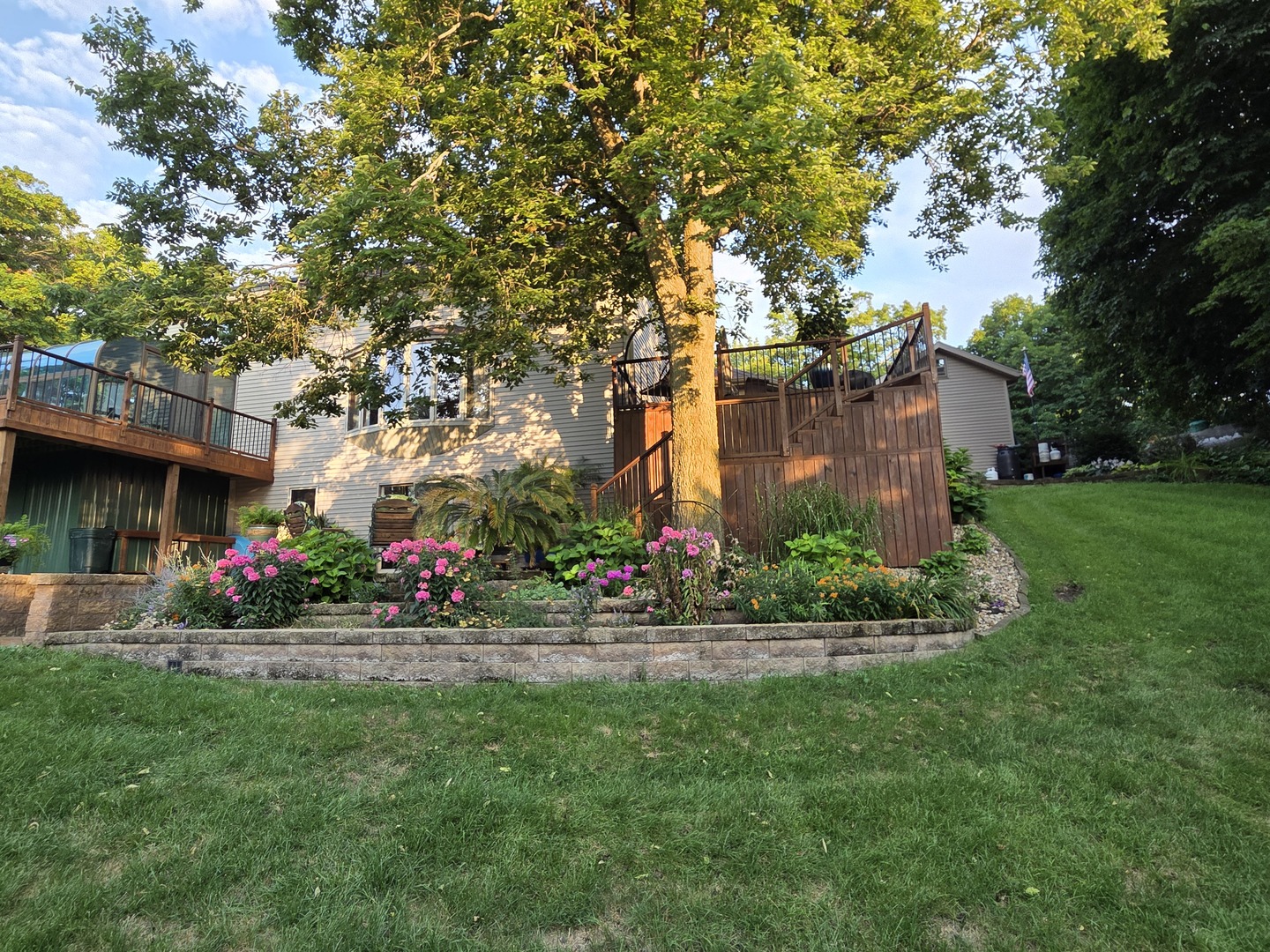 37322 Indian Spring Road Saybrook, IL 61770 - Photo 47 of 77 a front view of a house with a yard and potted plants