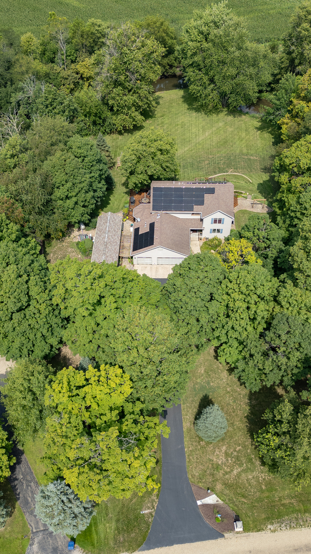 37322 Indian Spring Road Saybrook, IL 61770 - Photo 6 of 77 a backyard of a house with a yard and outdoor seating