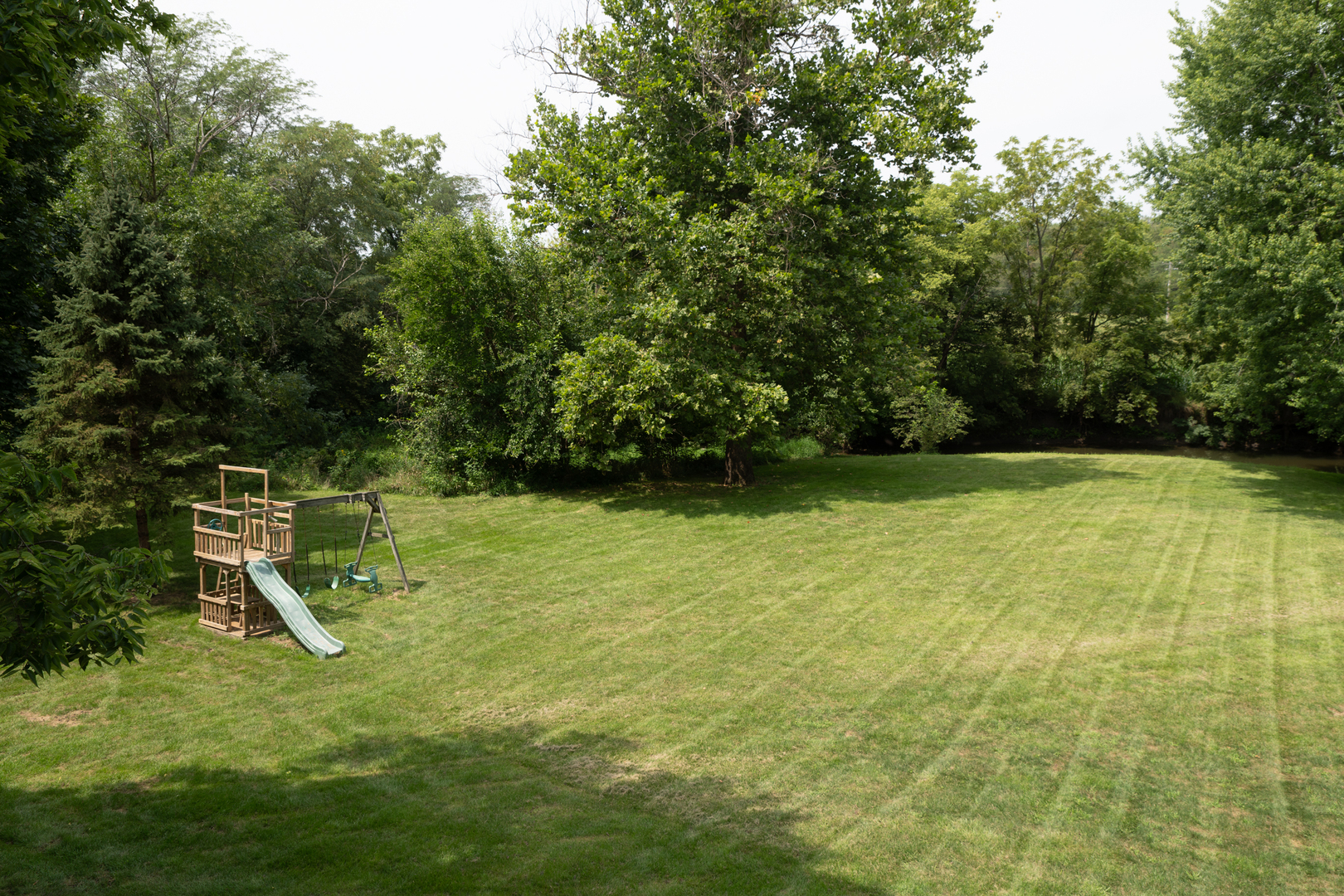 37322 Indian Spring Road Saybrook, IL 61770 - Photo 68 of 77 a view of a garden with a slide