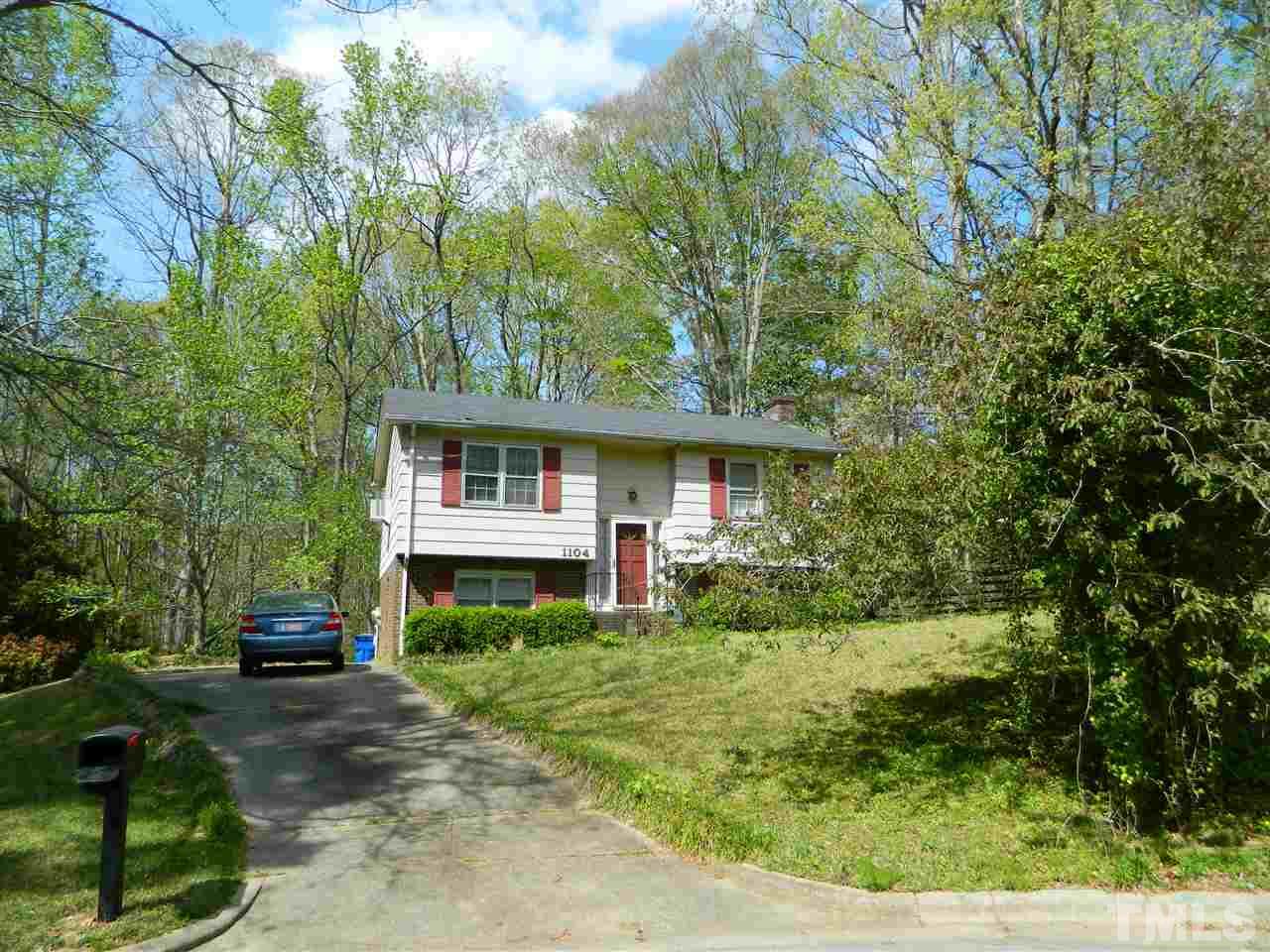 1104 Mockingbird Drive Raleigh, NC 27615 - Photo 2 of 10 a front view of a house with a yard
