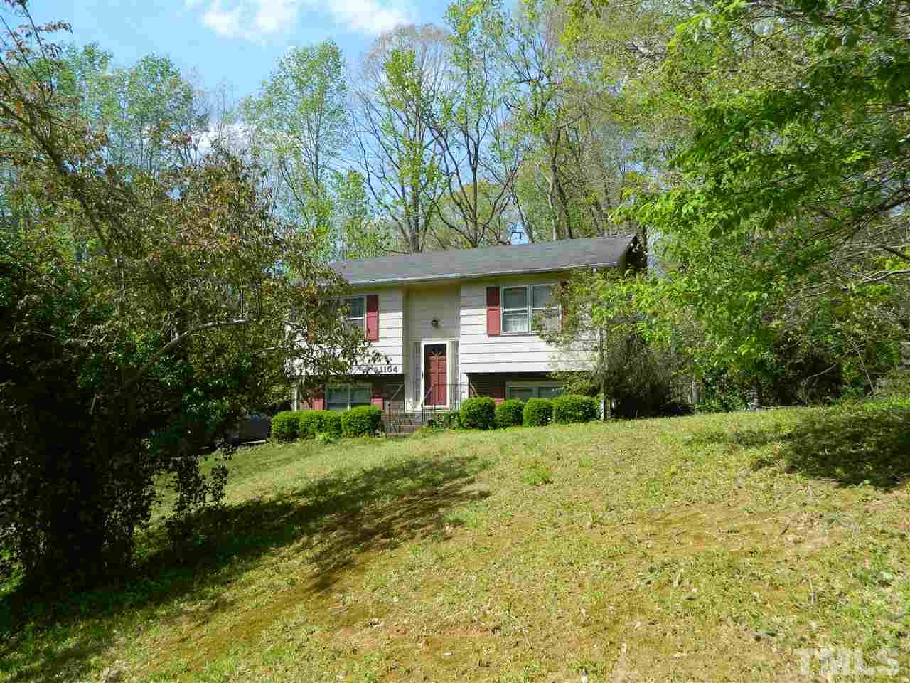1104 Mockingbird Drive Raleigh, NC 27615 - Photo 3 of 10 a front view of a house with a yard