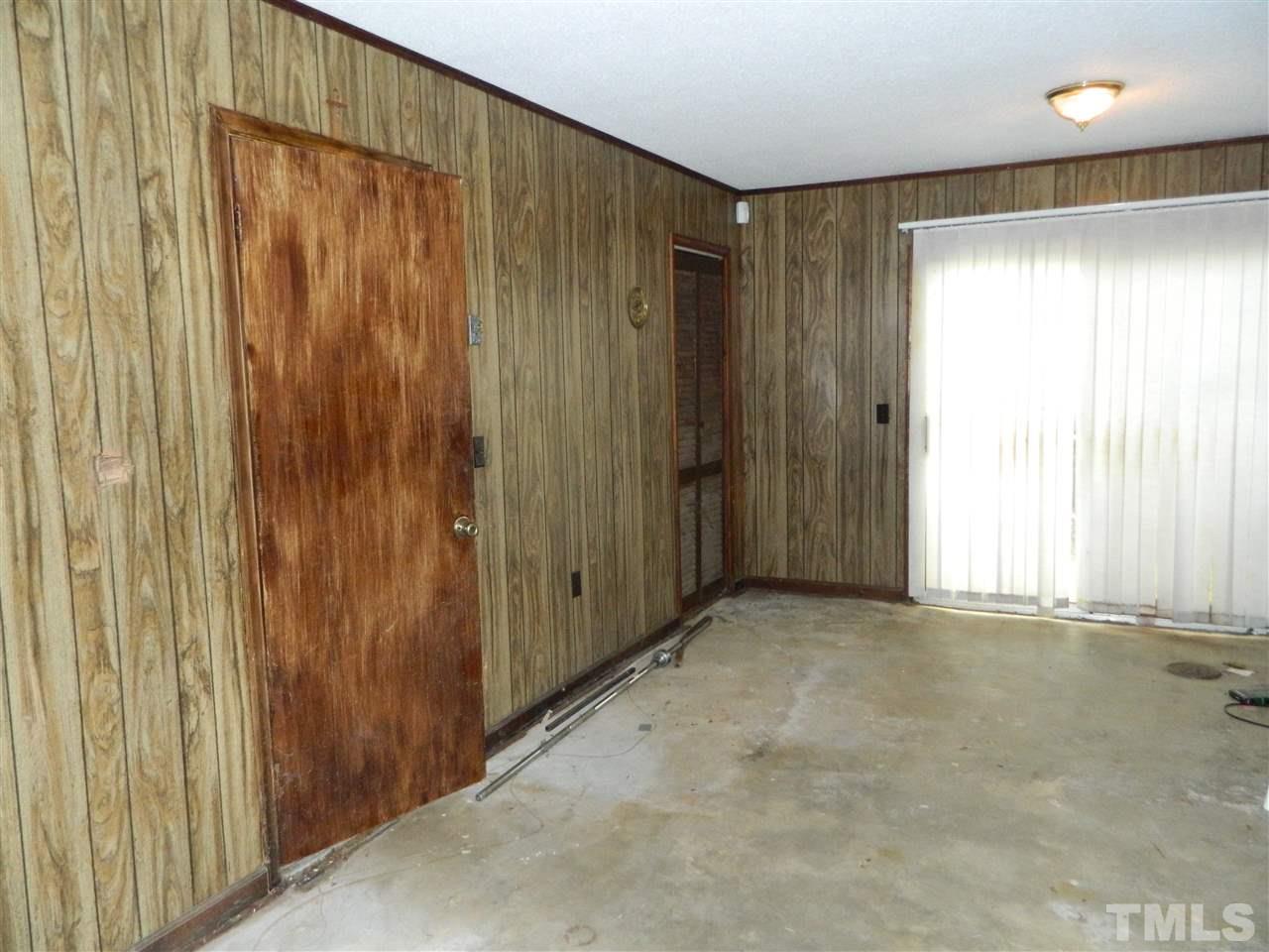 1104 Mockingbird Drive Raleigh, NC 27615 - Photo 9 of 10 a view of an empty room with a window