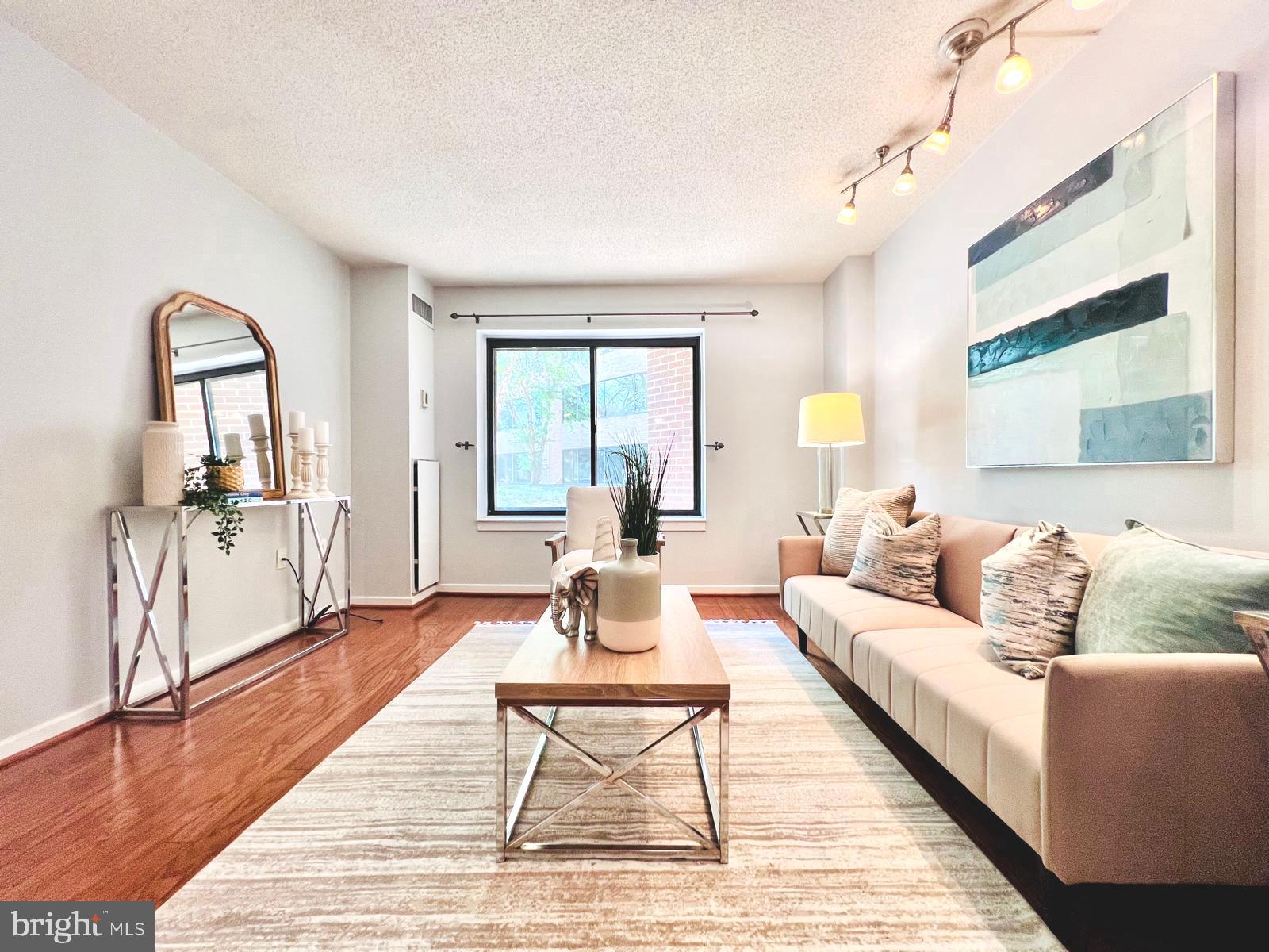 2111 Wisconsin Avenue Northwest, Unit 110 Washington, DC 20007 - Photo 2 of 32 Living-room