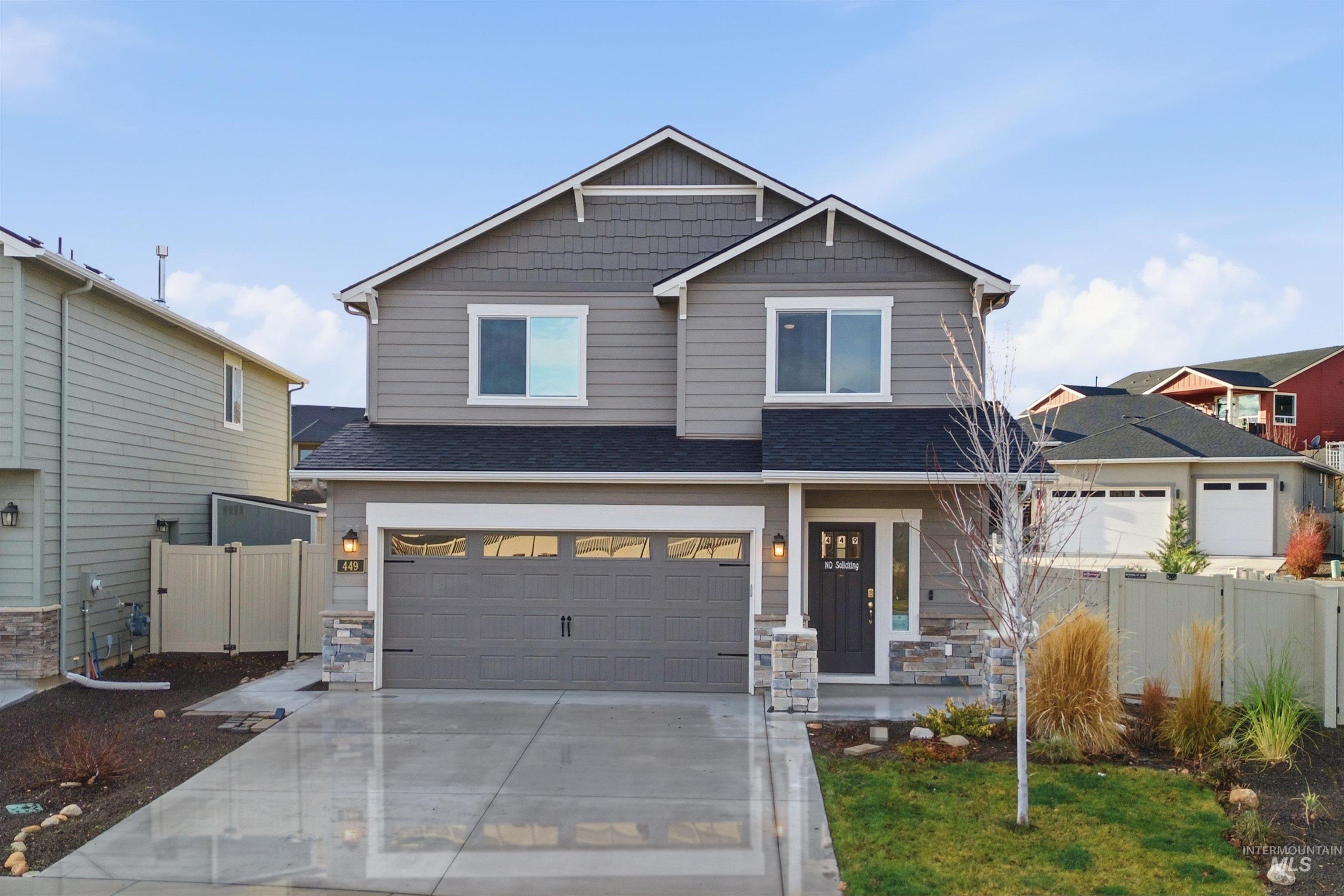 Craftsman house with stone siding, driveway, roof with shingles, a porch, and a garage