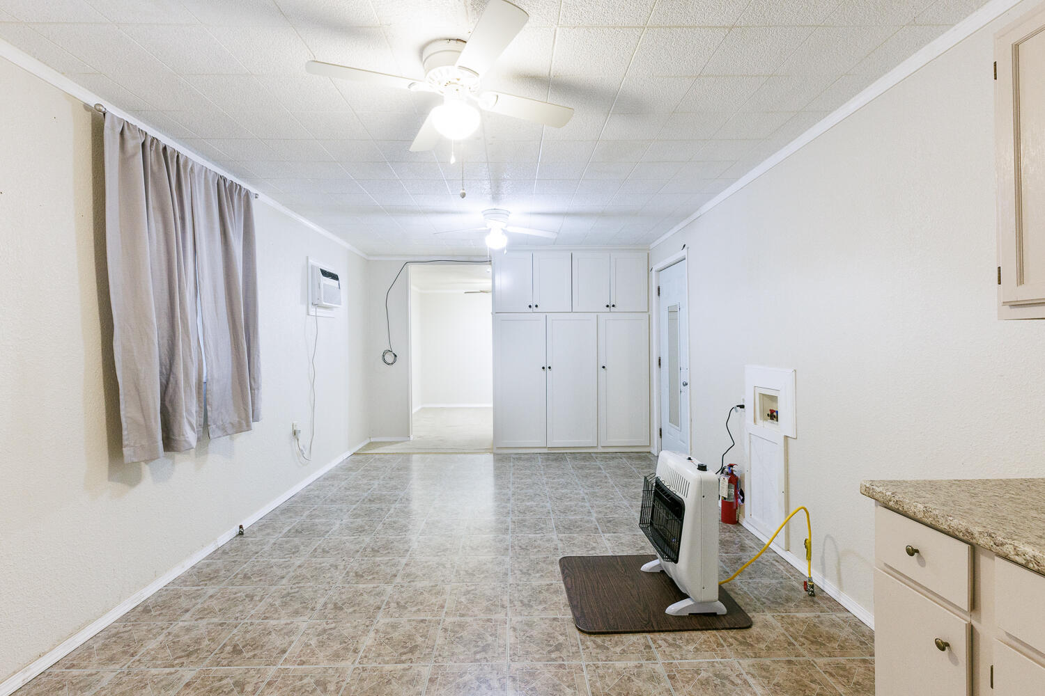 211 Chestnut Street Idalou, TX 79329 - Photo 14 of 31 a view of entryway with kitchen