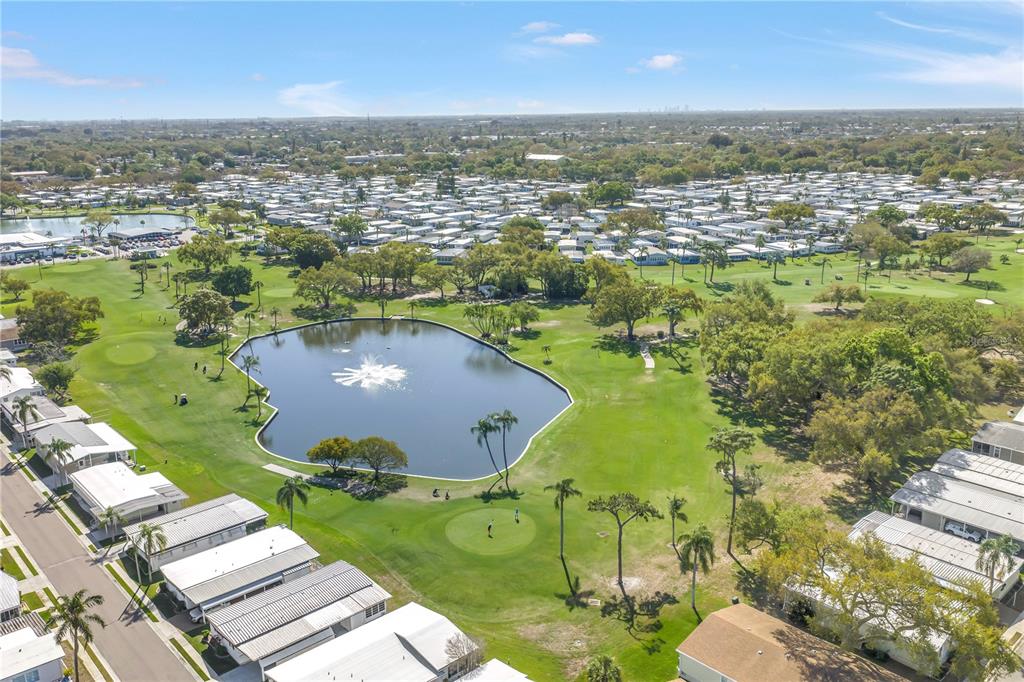 1100 South Belcher Road, Unit 502 Largo, FL 33771 - Photo 48 of 51 an aerial view of residential houses with outdoor space