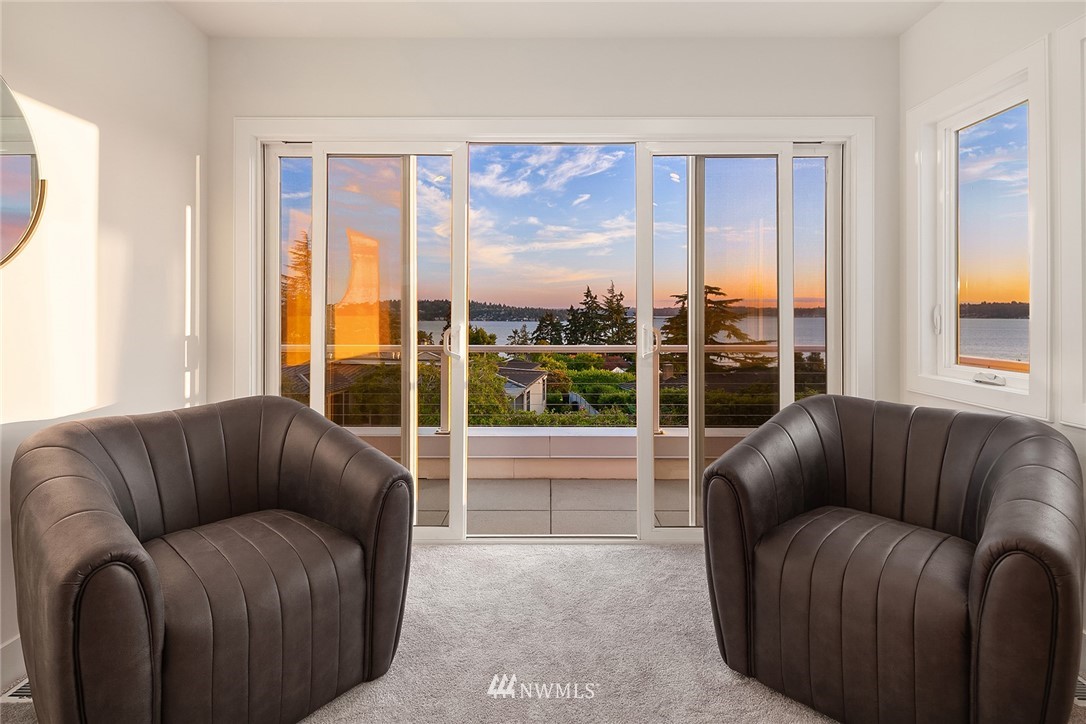 8431 Ridge Road Medina, WA 98039 - Photo 21 of 40 a living room with furniture and a large window