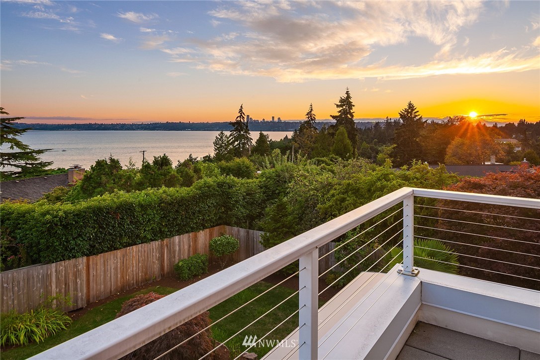 8431 Ridge Road Medina, WA 98039 - Photo 22 of 40 a view of city and mountain from a balcony