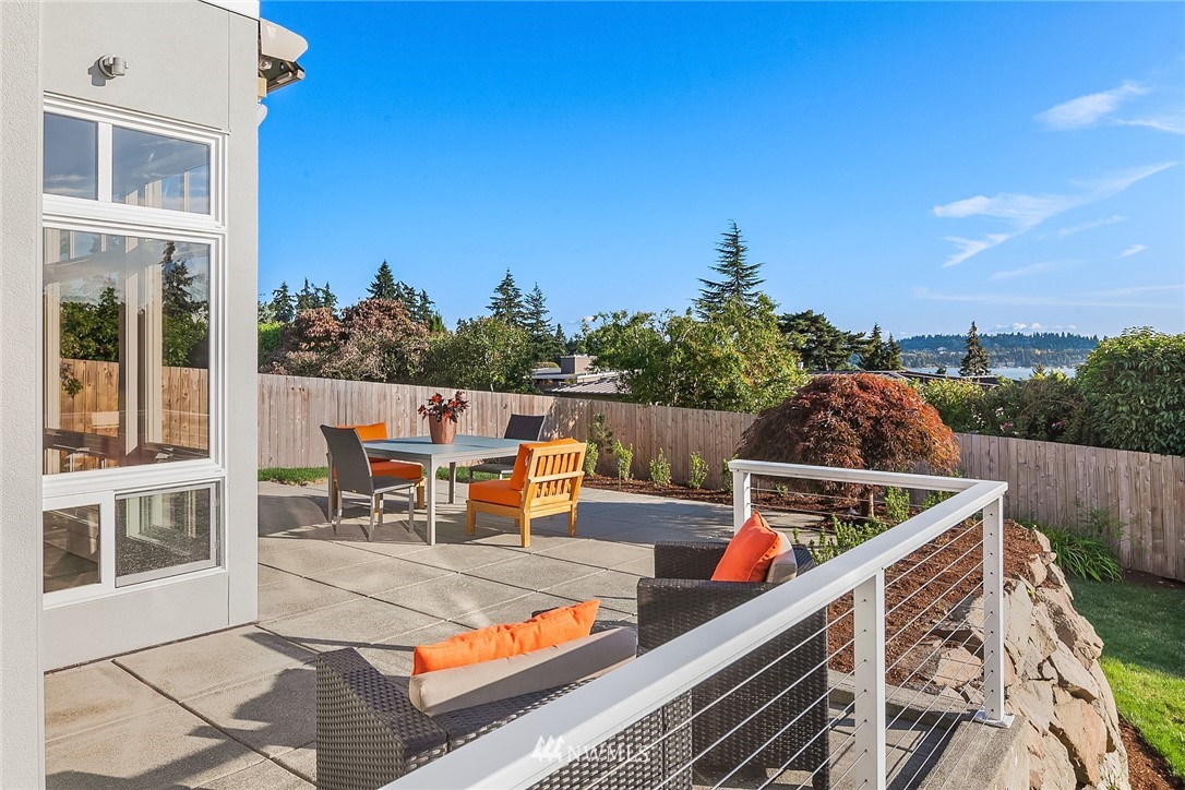 8431 Ridge Road Medina, WA 98039 - Photo 6 of 40 a view of a swimming pool with a patio