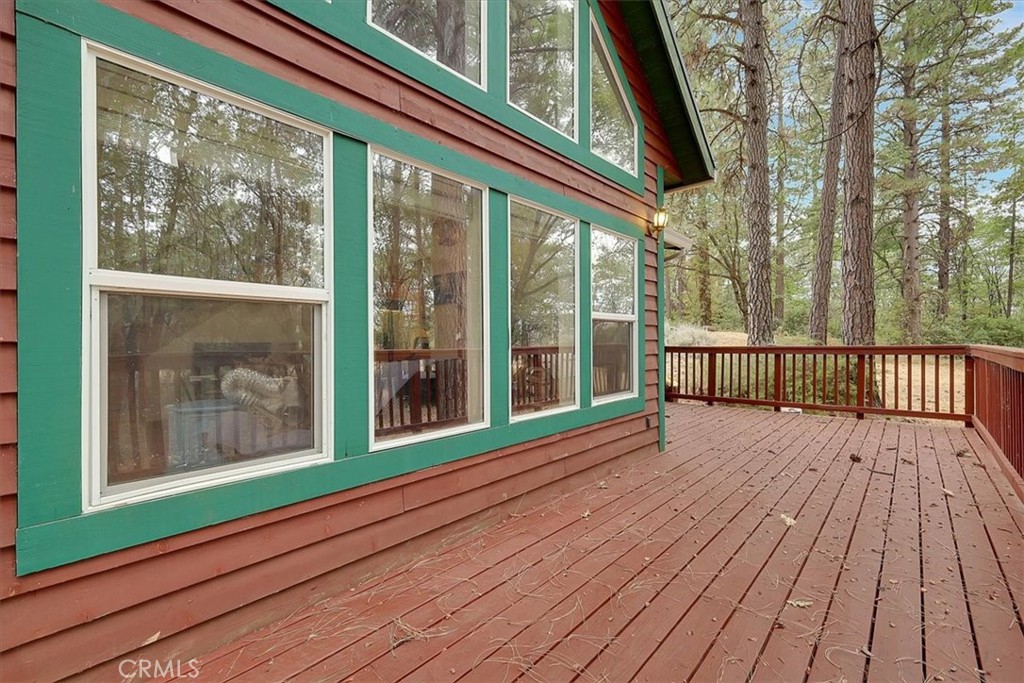 13233 Dixon Hill Road Oregon House, CA 95962 - Photo 11 of 60 a view of a wooden deck with a yard