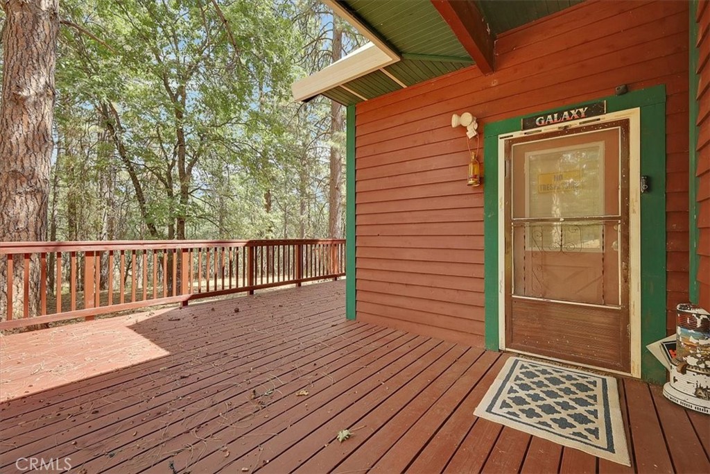 13233 Dixon Hill Road Oregon House, CA 95962 - Photo 12 of 60 a view of deck with wooden floor and fence