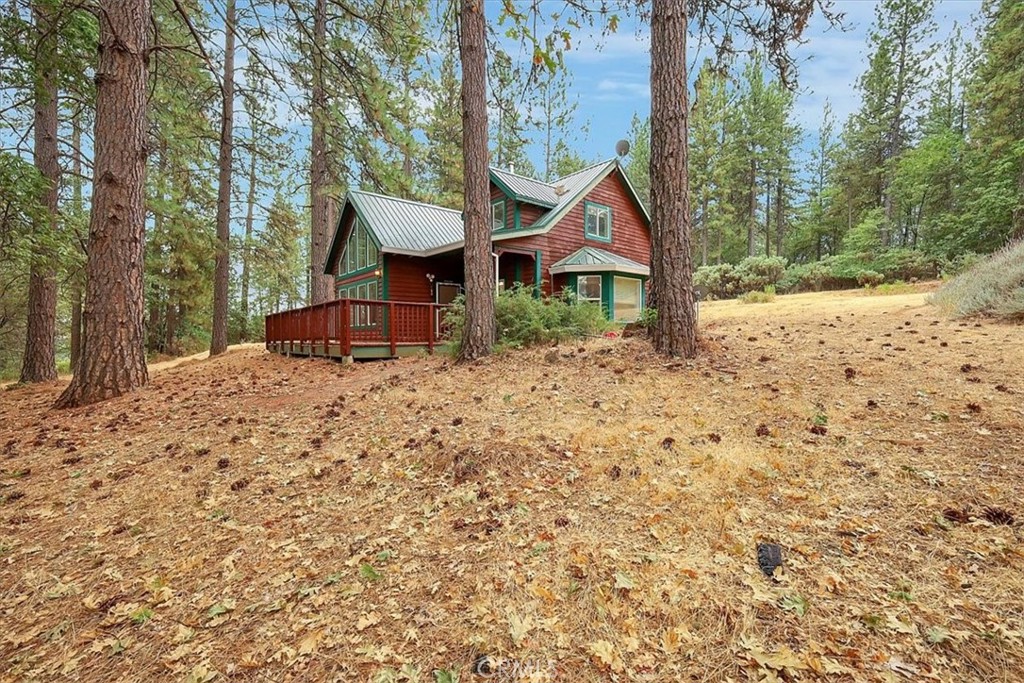 13233 Dixon Hill Road Oregon House, CA 95962 - Photo 2 of 60 a front view of a house with a yard and covered with snow