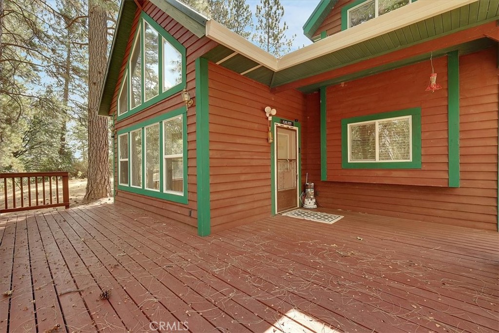 13233 Dixon Hill Road Oregon House, CA 95962 - Photo 34 of 60 a view of a house with porch and wooden floor