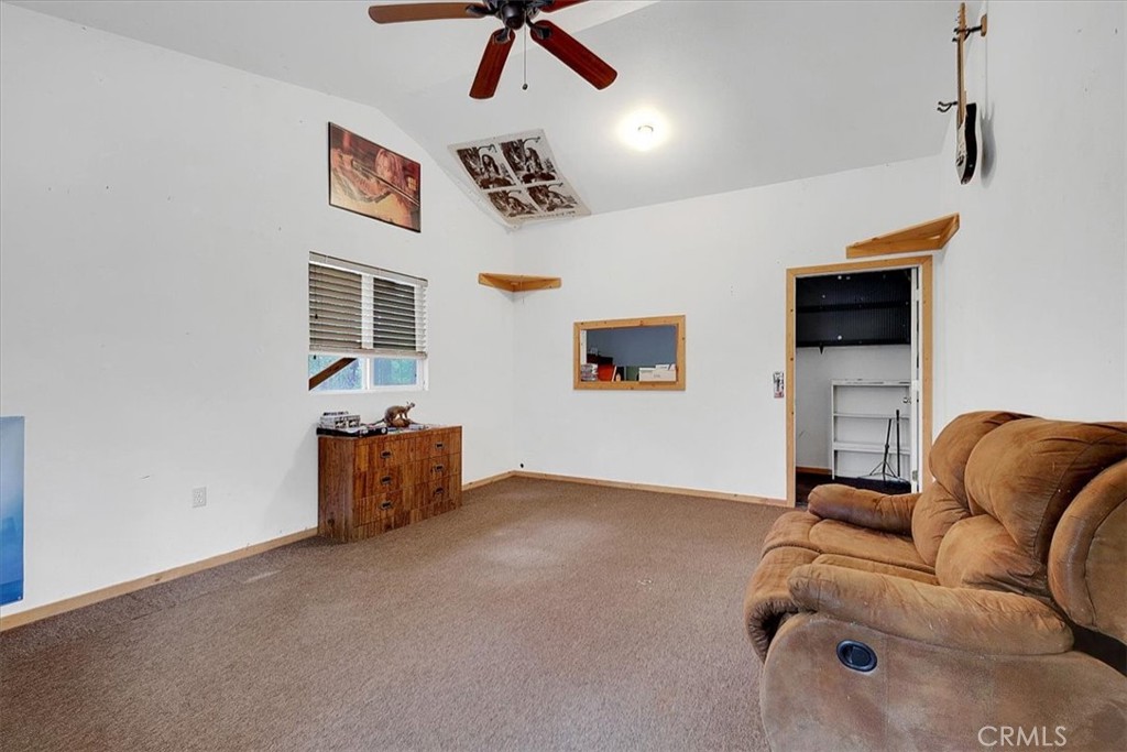 13233 Dixon Hill Road Oregon House, CA 95962 - Photo 38 of 60 a living room with furniture and a flat screen tv