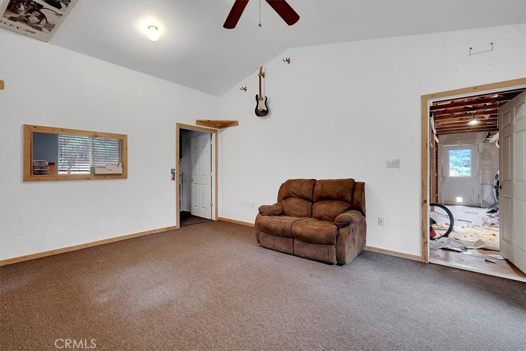 13233 Dixon Hill Road Oregon House, CA 95962 - Photo 39 of 60 a living room with furniture and a ceiling fan