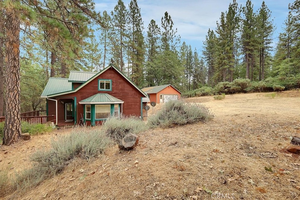 13233 Dixon Hill Road Oregon House, CA 95962 - Photo 44 of 60 a front view of a house with a yard and garage