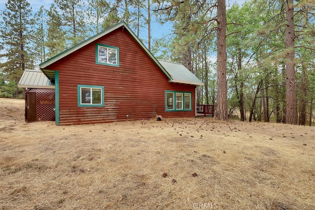 13233 Dixon Hill Road Oregon House, CA 95962 - Photo 7 of 60 a view of a house with a backyard