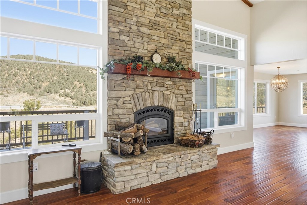 9401 Whispering Pines Road Frazier Park, CA 93225 - Photo 11 of 49 a living room with furniture a fireplace and next to a window