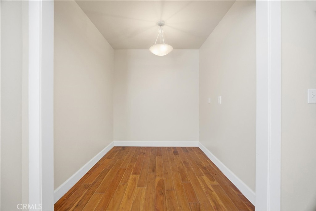 9401 Whispering Pines Road Frazier Park, CA 93225 - Photo 30 of 49 a view of a room with wooden floor and a window
