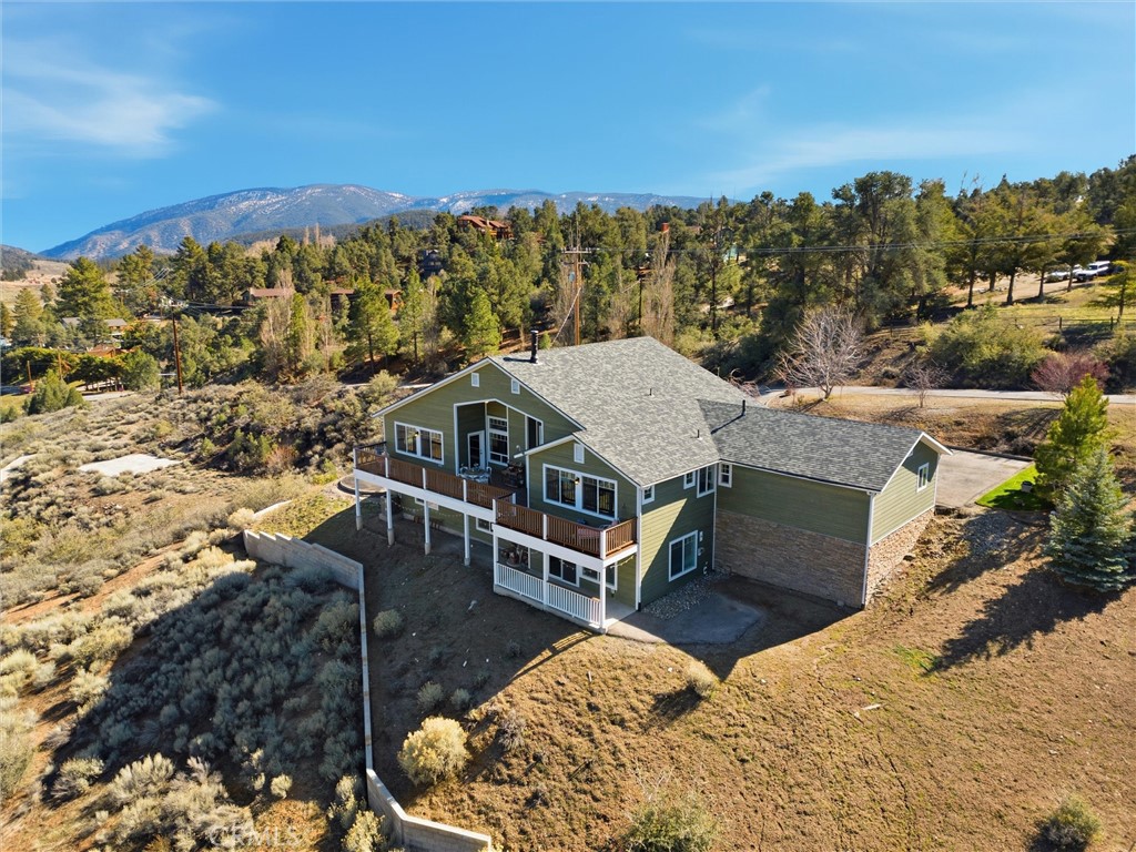 9401 Whispering Pines Road Frazier Park, CA 93225 - Photo 3 of 49 a view of a house with a mountain